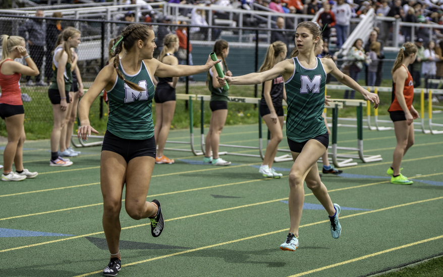 girls passing baton